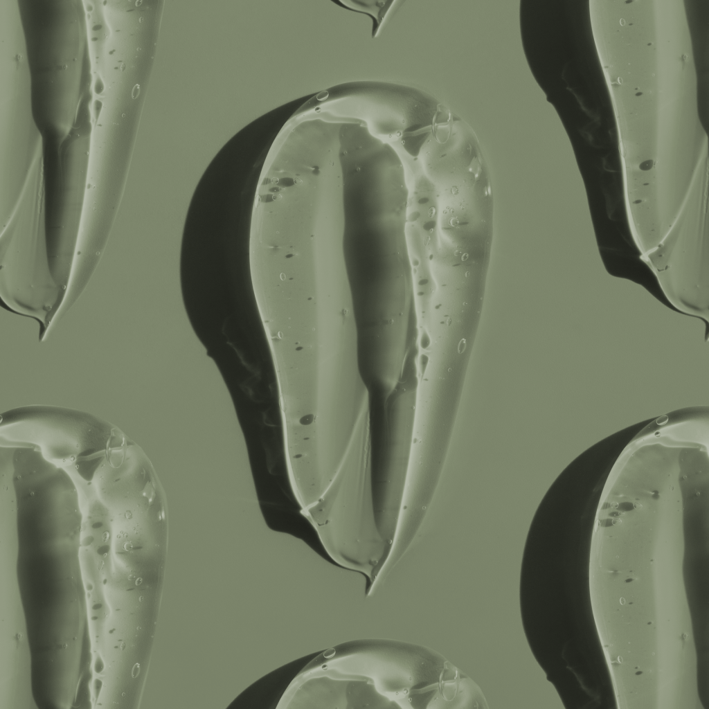 cosmetic-smears-cream-gel-texture-green-background copiar